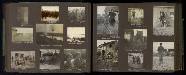 Black and white photographs. Thirteen photographs are arranged across two pages of an album. They show buildings, towns, smoke, landscape, and aerial views. Each is labelled in white on the black paper.